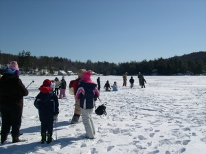kids ice fishing on the lake
