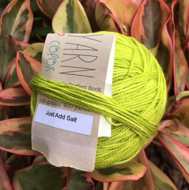 Bright lime green fingering weight yarn.  "Just Add Salt" by Emma's Yarn
