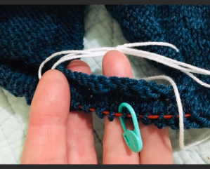 Ridge of extra cast on stitches which became part of the armhole