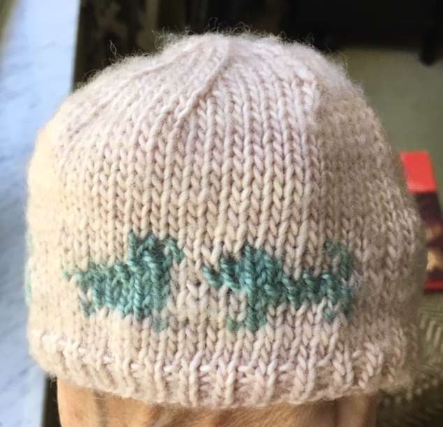 Faded baby hat in Mad Tosh merino light, after washing